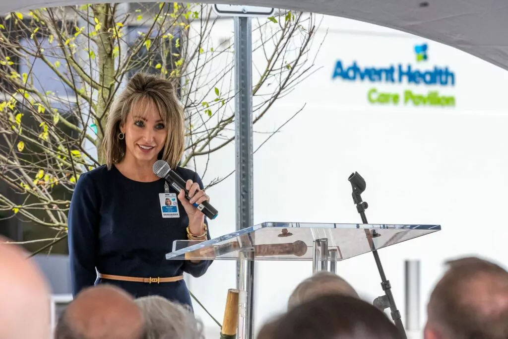 Doctor giving a presentation at the AdventHealth Care Pavilion in Ocala, FL