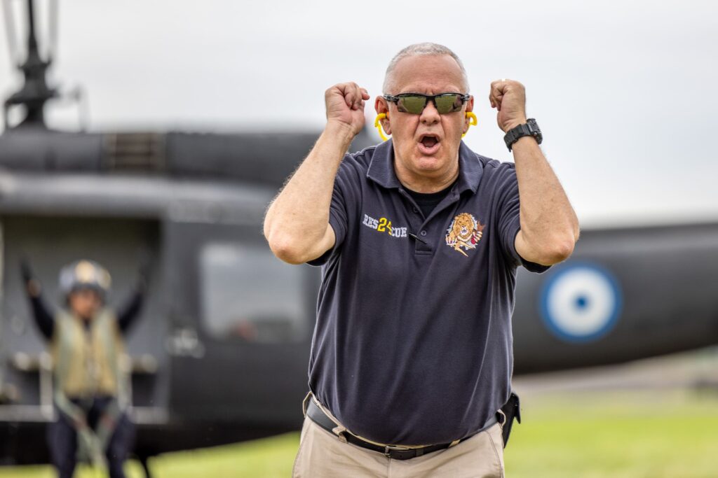 Helicopter rescue instructor giving instructions | El Salvador | Maven Photo and Film | Adventure + Travel