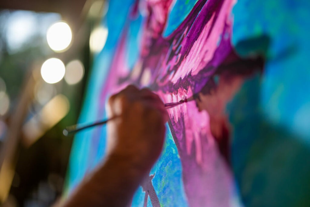 Painter painting at the Battle of the Brushes | Arts + Culture | Maven Photo and Film | Ocala, Florida