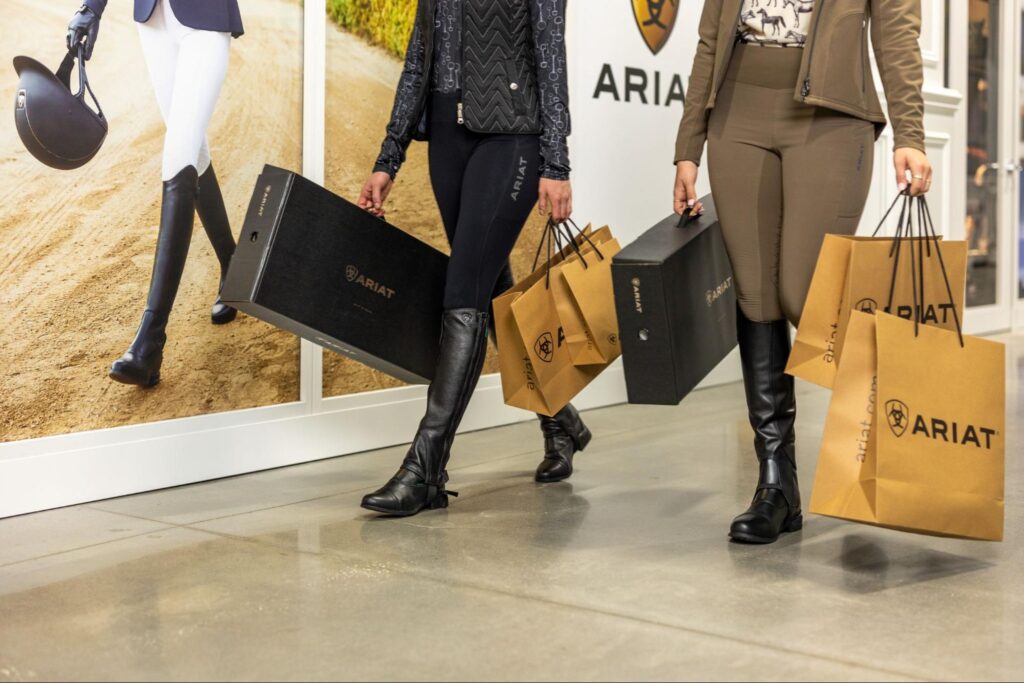 Shoppers carrying Ariat bags | Photography | MAVEN Photo + Film